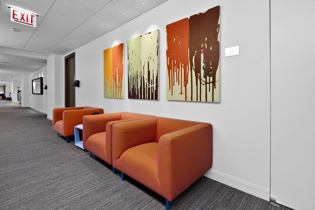 Lounge seating area outside the Summit Chicago meeting rooms