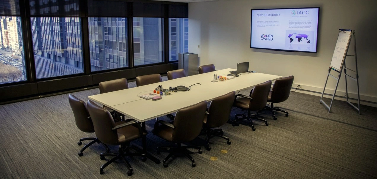Boardroom at Summit Chicago set for a meeting with LED lighting and city views